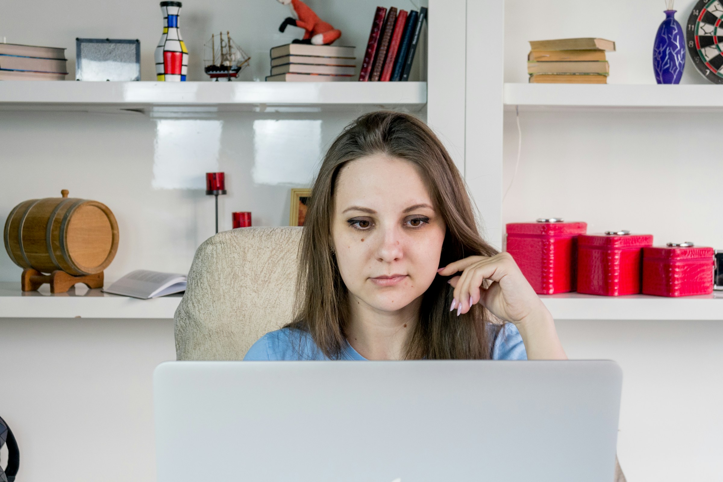 woman on a laptop - Master Data Management Solution