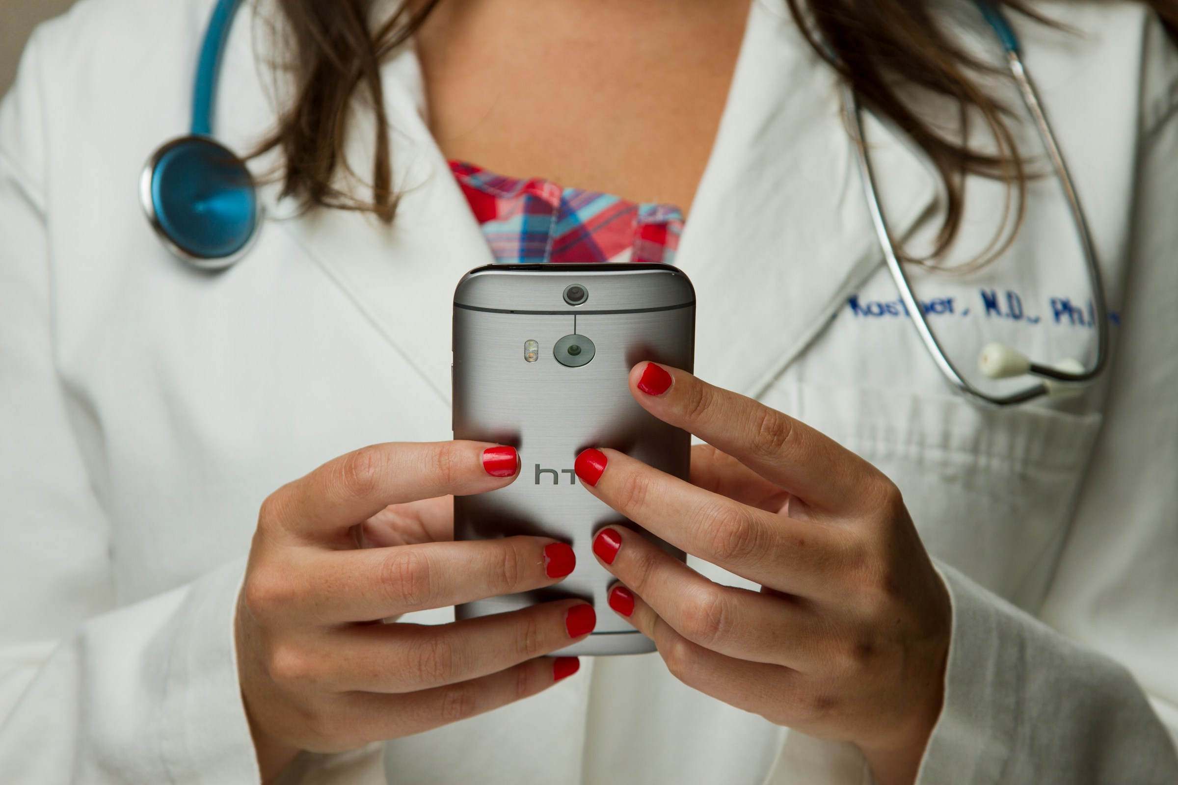 doctor on a phone - Healthcare Data Management