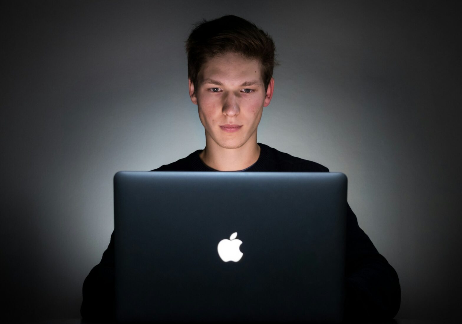 man with a laptop - Healthcare Data Governance