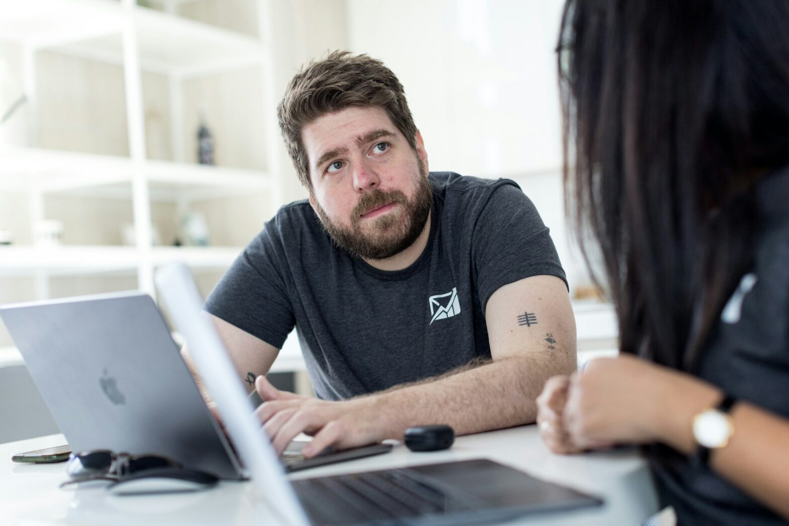 man on a laptop - Healthcare Data Management Software