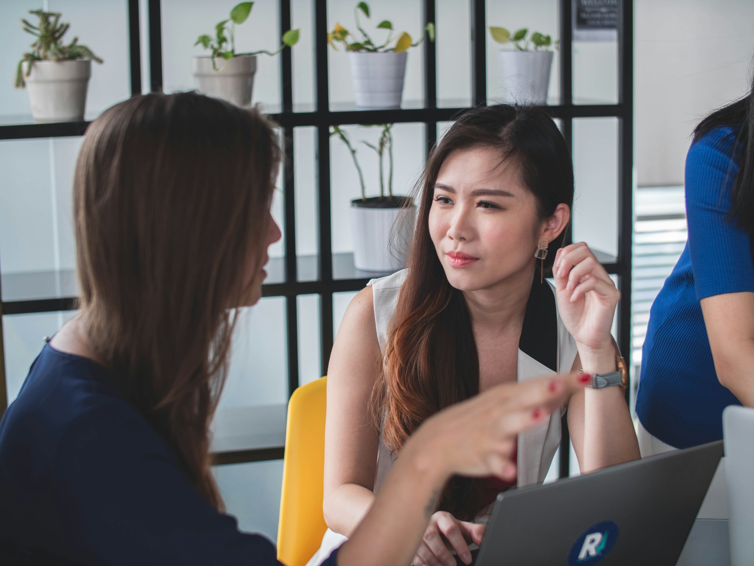 woman on a laptop - Credentialing in Healthcare 