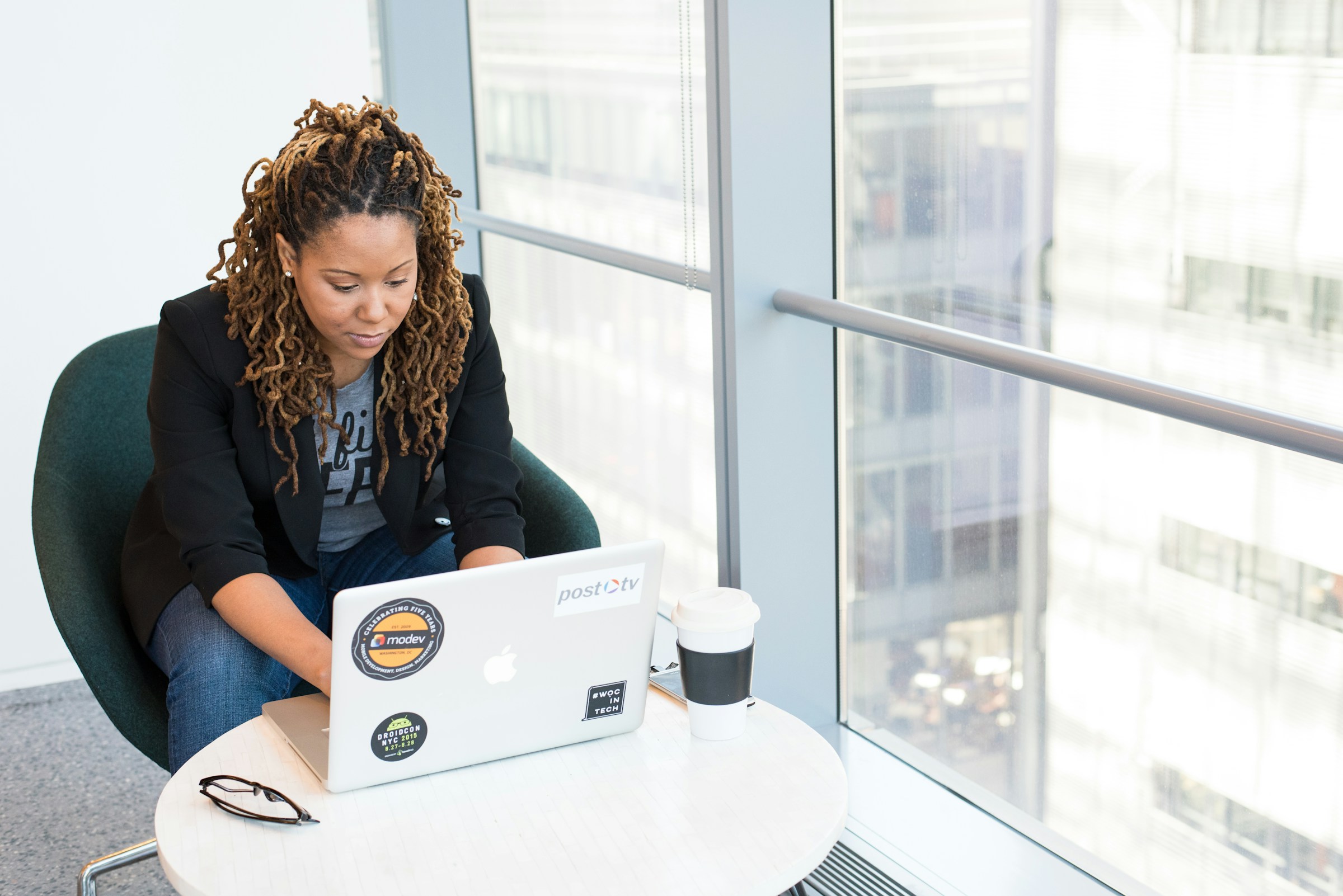 woman on a laptop - Primary Source Verification Credentialing