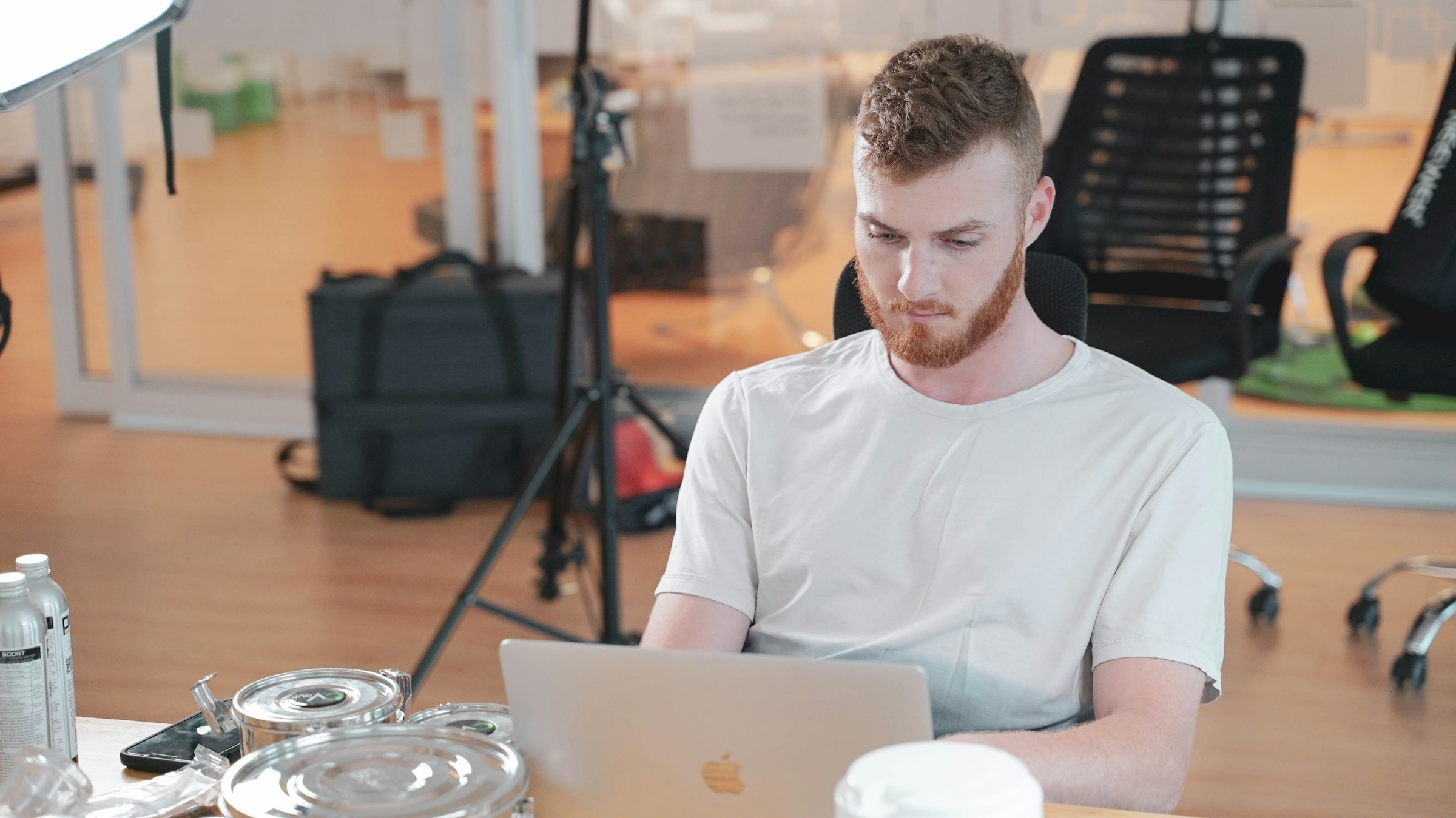 man typing on a laptop - How to Hire A Project Manager