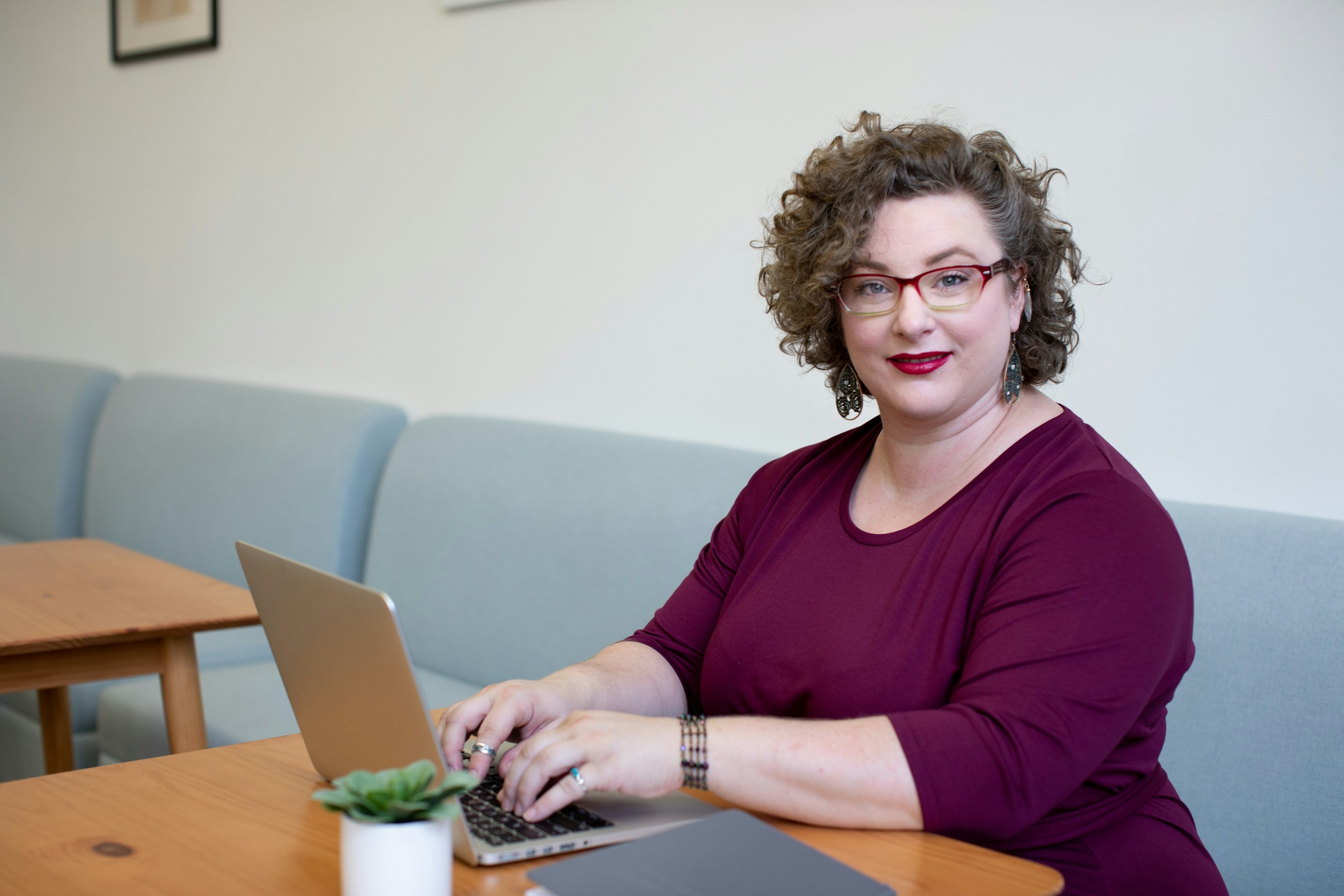 woman on a laptop - Scrum Master Skills