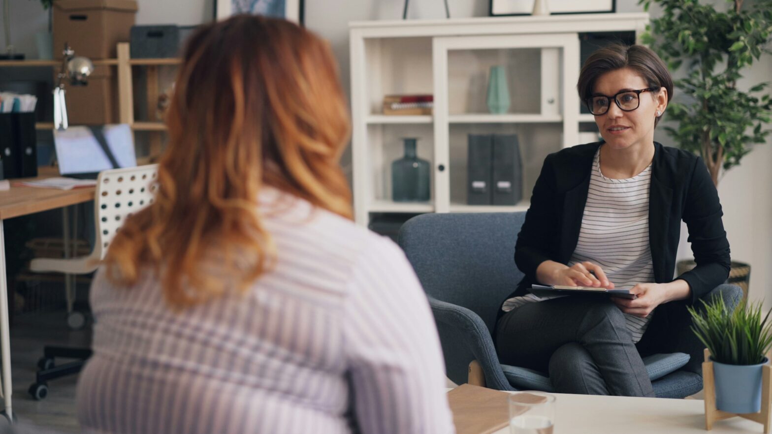 women talking - Top Healthcare Recruiters